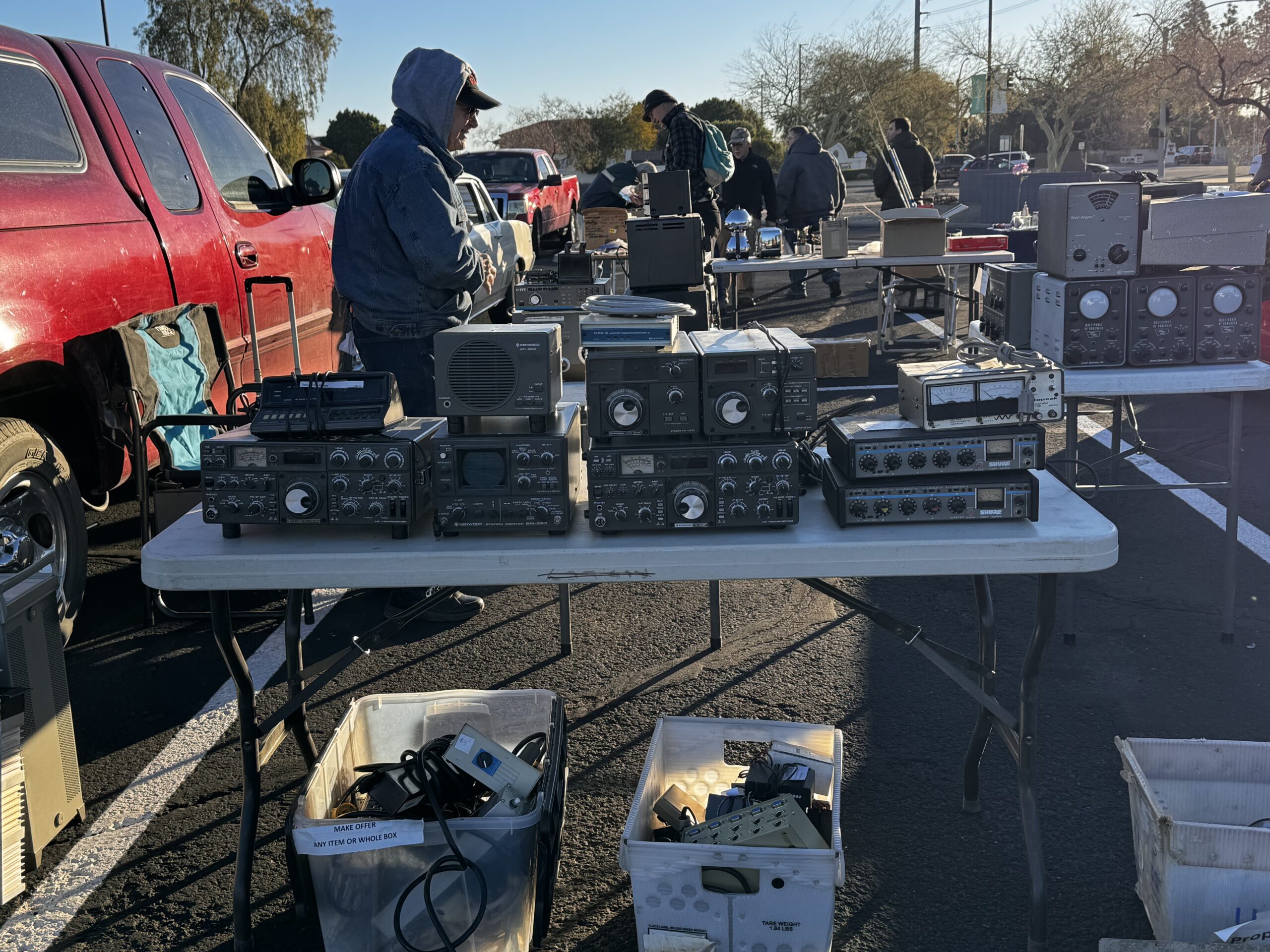 Hamfest attendees browsing vendor tables